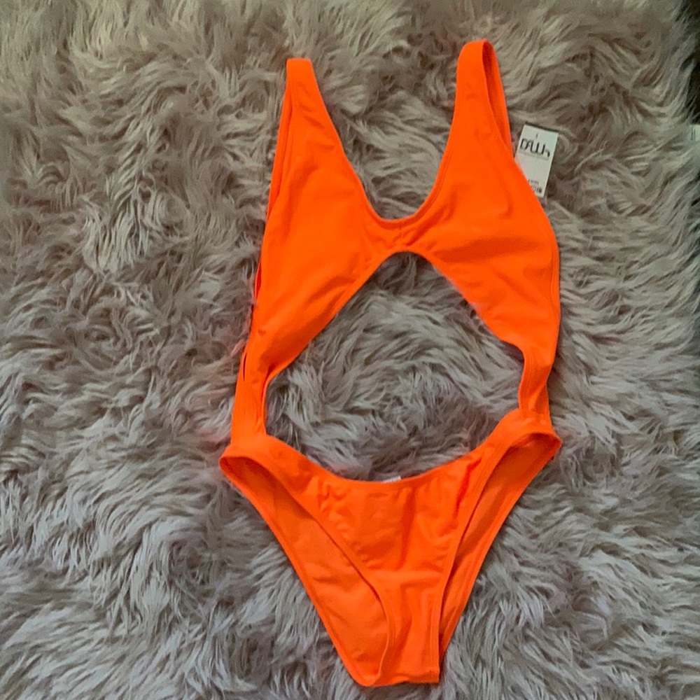 One piece cutout bathing suit. Never worn